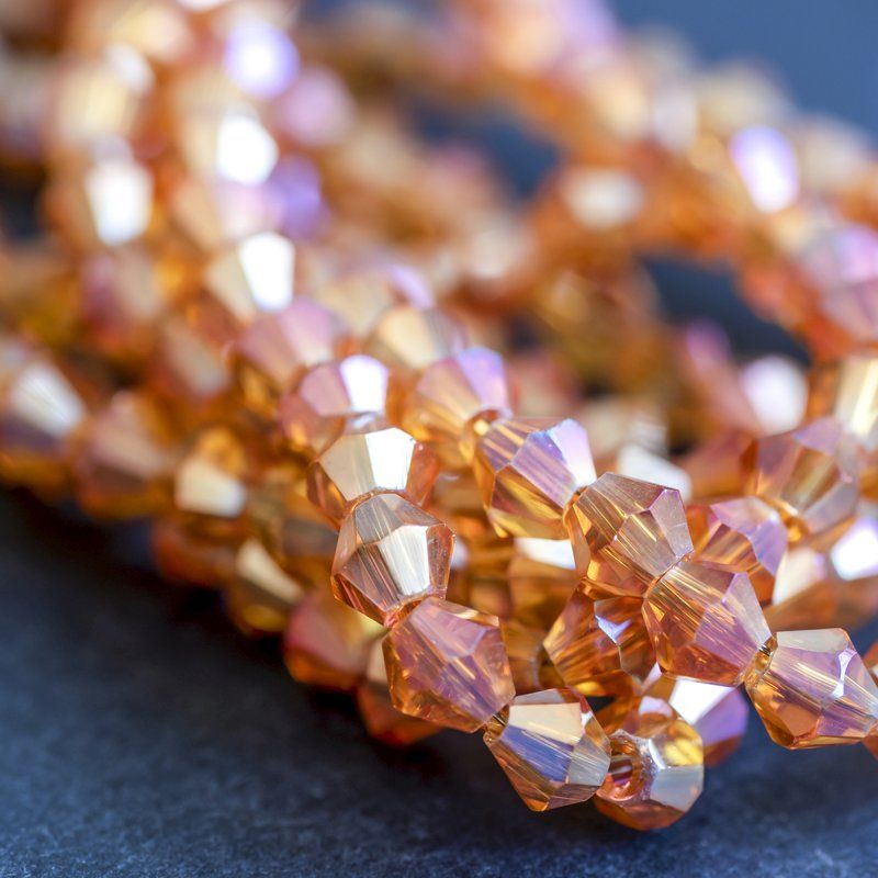 бусина, стекло биконус, цвет оранжевый бензиновый, 4 мм (уп.30+/-5 шт)