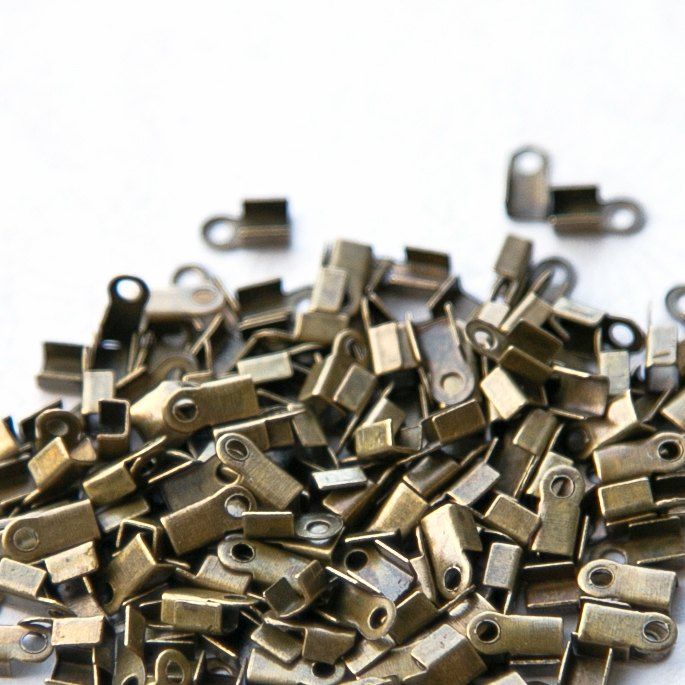 зажим для шнура, цвет античная бронза, 6x3x2.3 мм (уп 40 +/-5 шт)
