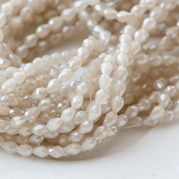 бусина, имитация нефрита, граненая, стекло капля, цвет бежевый радужный, 5х3 мм