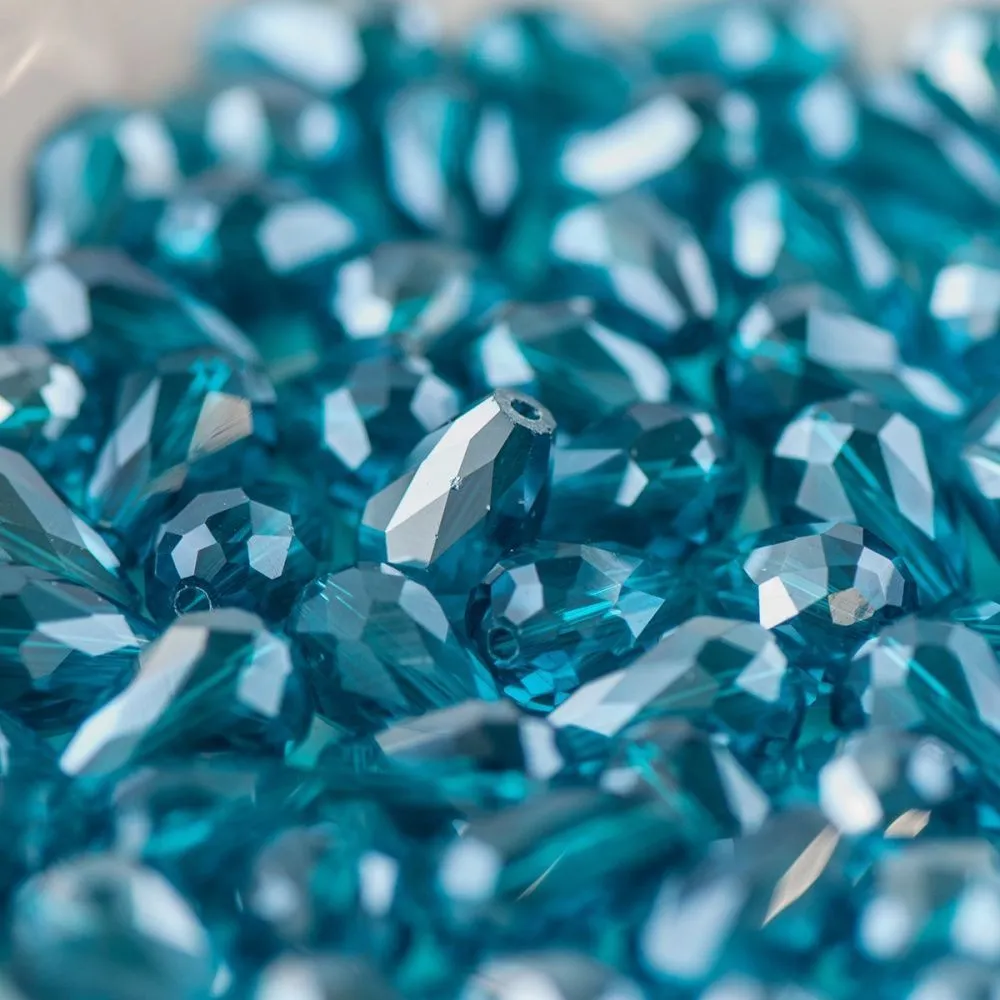 бусина "капля", граненая, стекло, цвет бирюзовый радужный, 15х10 мм