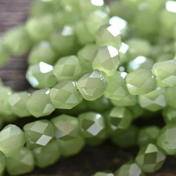 бусина, стекло бочонок 4, граненая, цвет зеленый перламутровый, 4x4 мм (уп 30+/-5 шт)