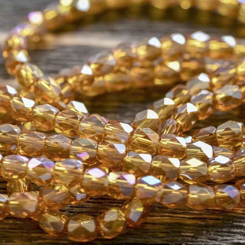 бусина, стекло бочонок 4, граненая, цвет золотисто-оранжевый радужный, 4x4 мм (уп 30+/-5 шт)